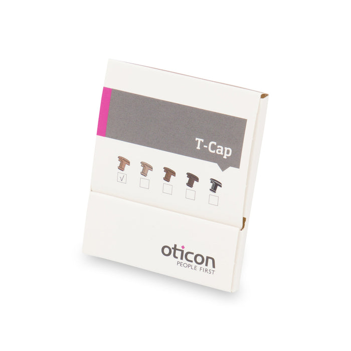 Oticon beige T-Cap Filters used as mic protectors  